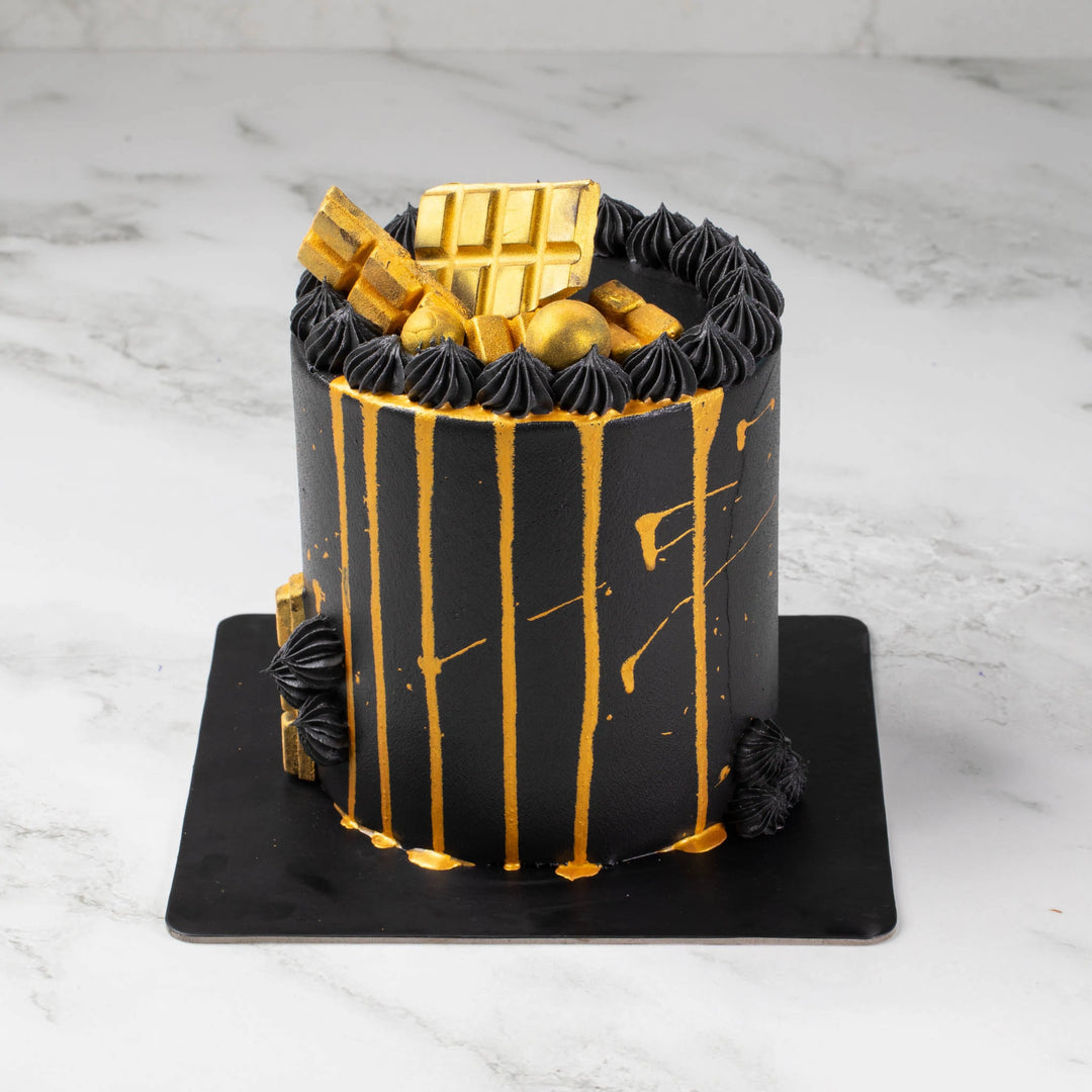 Luxury Chocolate Cake with Golden Chocolates