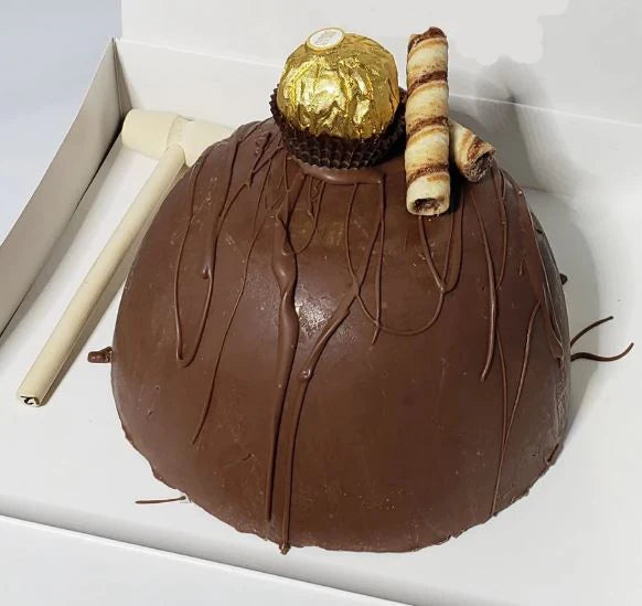 Savory Ferrerorocher Pinata Cake